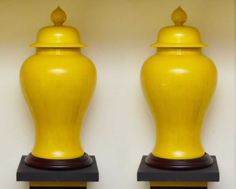 Appraisal: PAIR CHINESE YELLOW GLAZED JARS Baluster form jars with lids