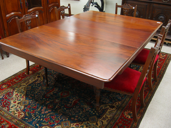 Appraisal: A VICTORIAN SQUARE MAHOGANY PEDESTAL DINING TABLE WITH ONE LEAF