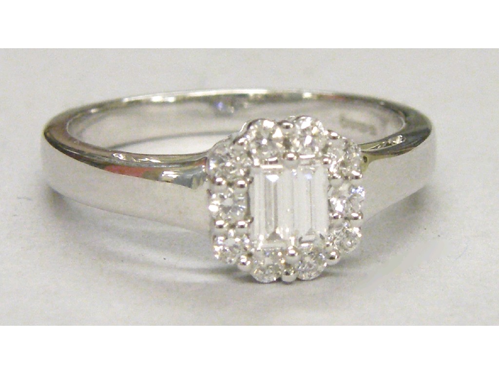 Appraisal: ct white gold diamond cluster ring set with two baguette