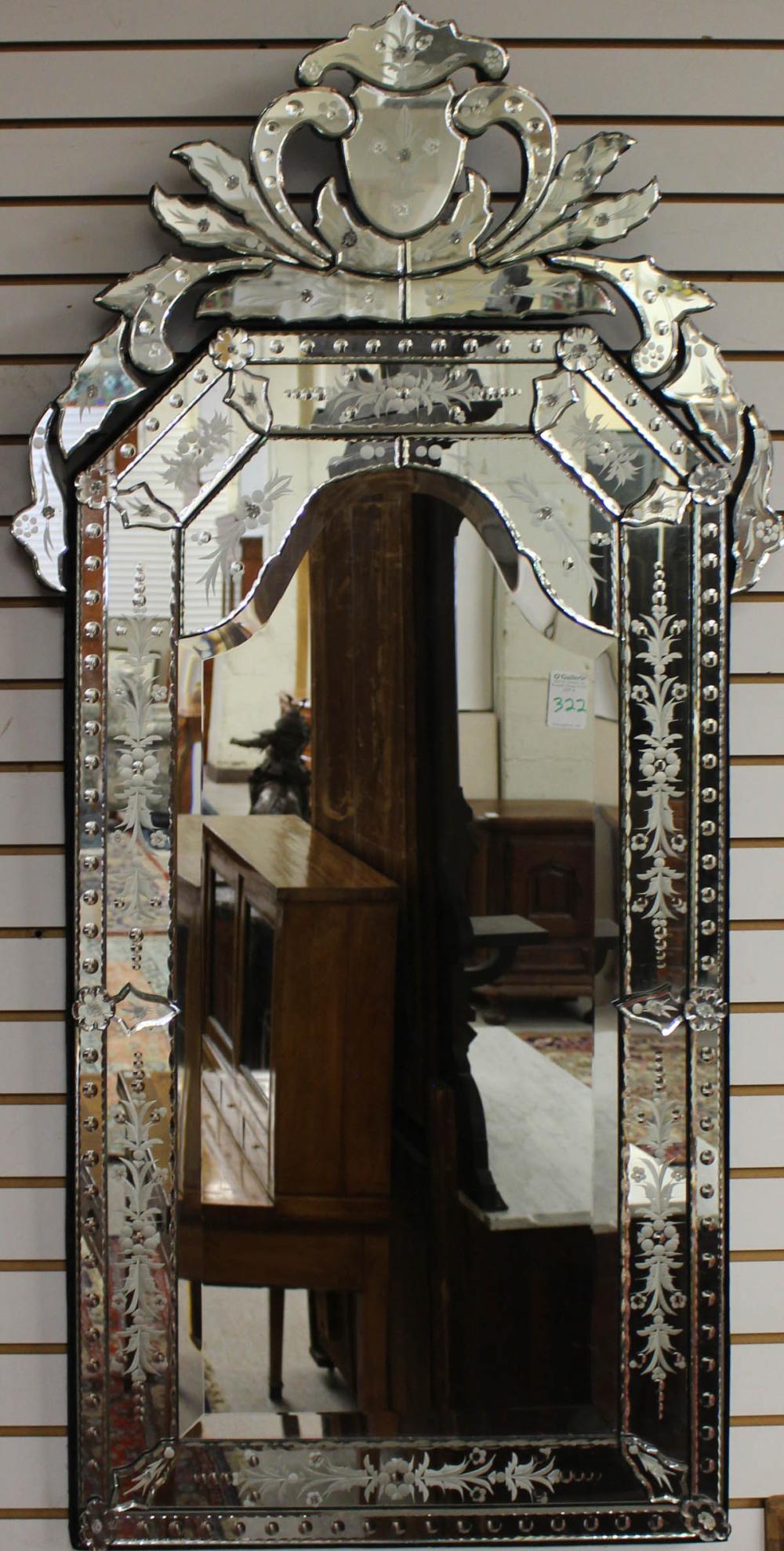 Appraisal: VENETIAN STYLE WALL MIRROR a beveled mirror with scalloped and