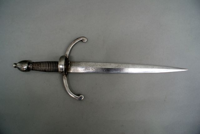 Appraisal: A European left hand dagger inch double edged blade with