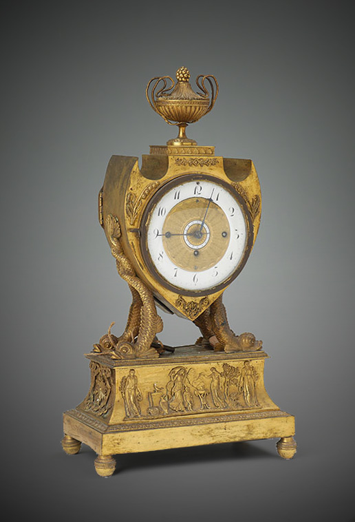 Appraisal: FRENCH EMPIRE SILK THREAD FIGURAL MANTLE CLOCK Gilt decorated brass