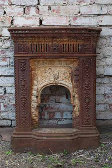 Appraisal: A TH CENTURY FRENCH CAST IRON FIRE SURROUND