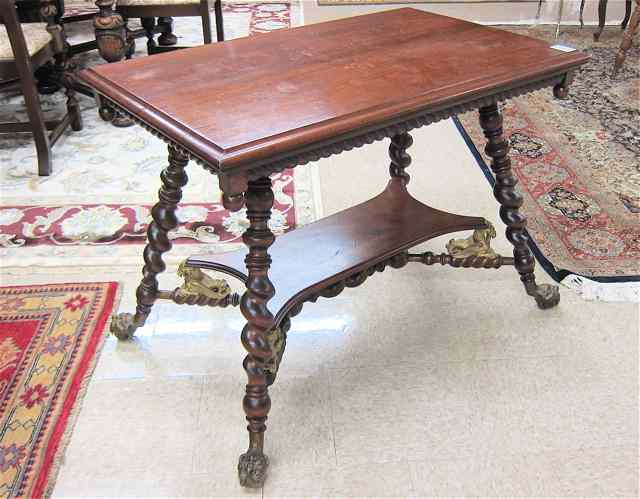 Appraisal: VICTORIAN WALNUT CENTER TABLE American c having a rectangular walnut