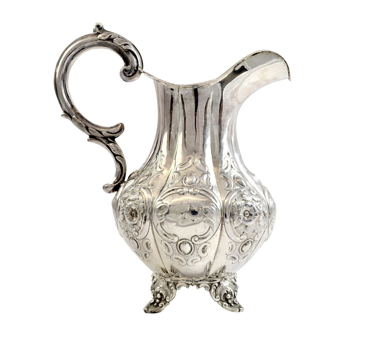 Appraisal: A Victorian silver large milk jug of melon fluted form