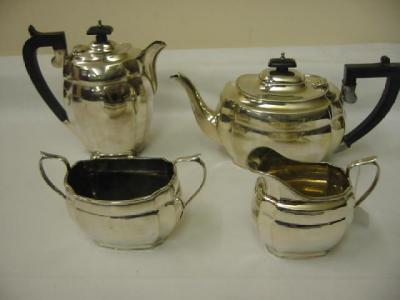 Appraisal: A FOUR PIECE TEA SET of bellied oblong form with