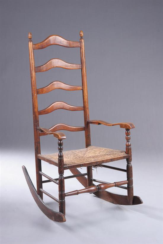 Appraisal: AMERICAN LADDER-BACK OPEN ARM ROCKER late th century With five