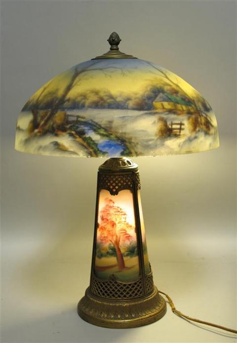 Appraisal: HANDEL REVERSE PAINTED GLASS GILT BRONZE LAMP The domed shade