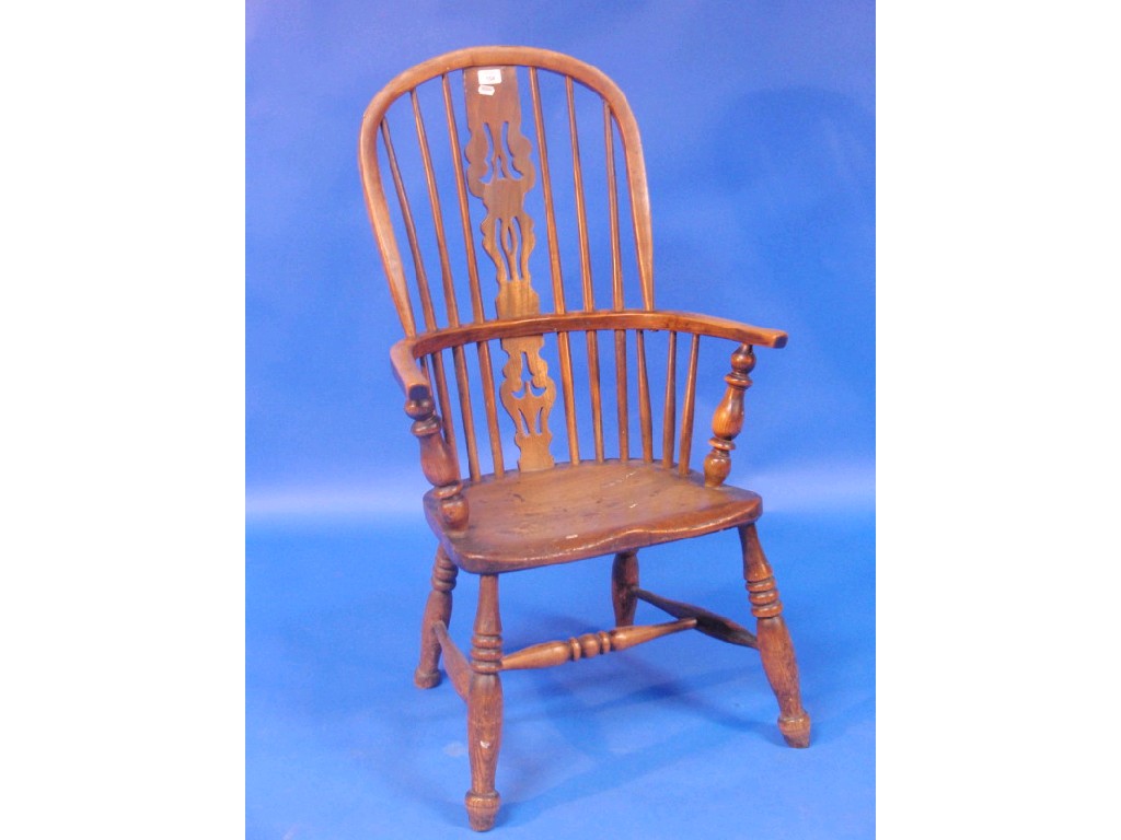 Appraisal: A thC elm and ash Windsor chair the high back