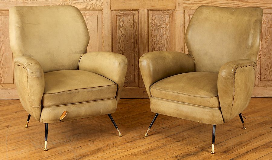 Appraisal: PAIR MID CENTURY MODERN LEATHER CHAIRS IRON LEGS A pair