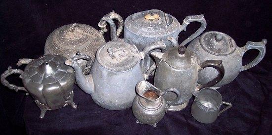 Appraisal: Sundry pewter teapots jugs etc some with traces of silver