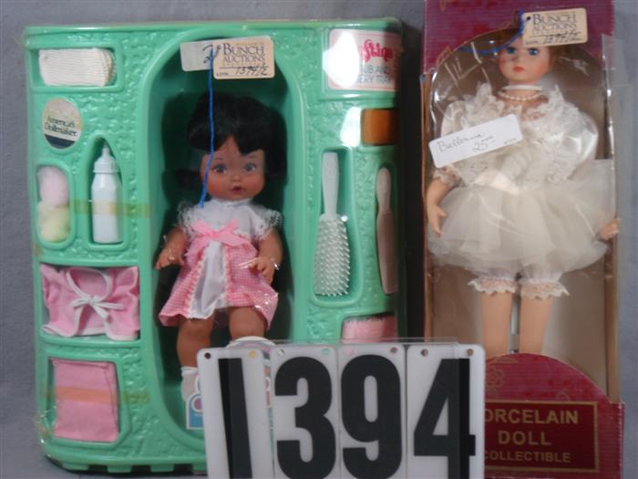 Appraisal: Lot of dolls in original packaging to include porcelain collectible