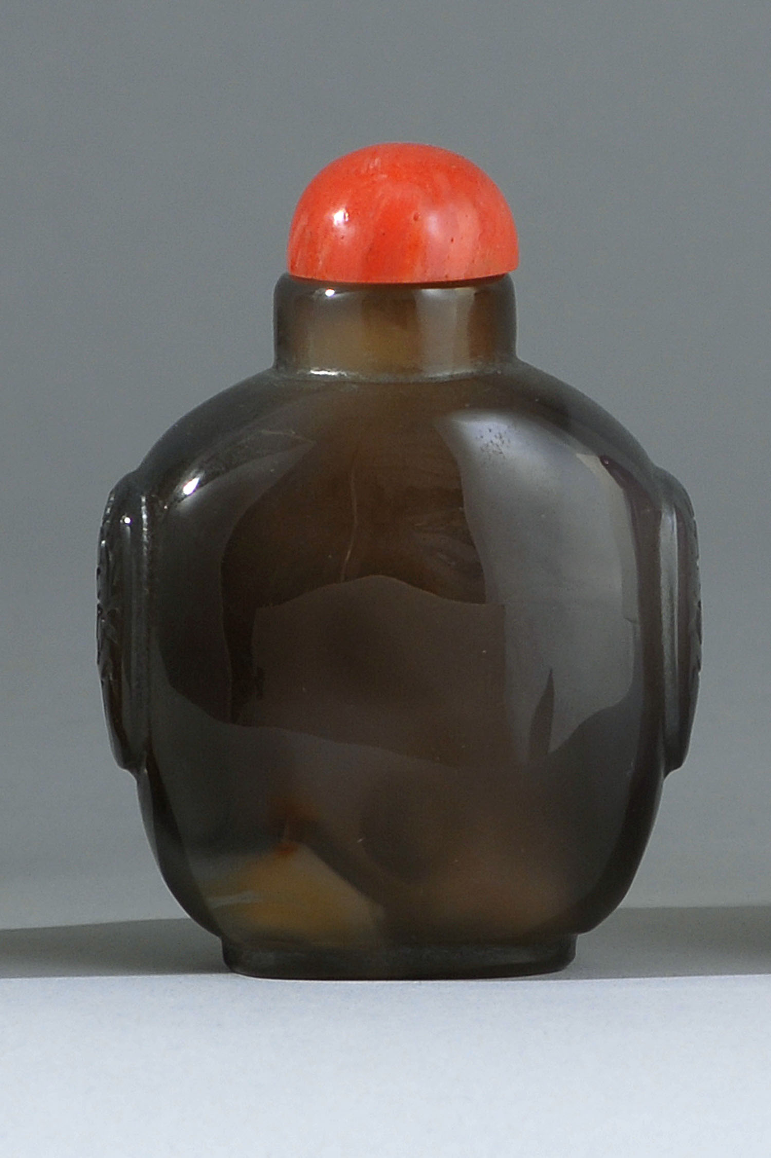 Appraisal: CHALCEDONY AGATE SNUFF BOTTLE Early th CenturyIn flattened ovoid form