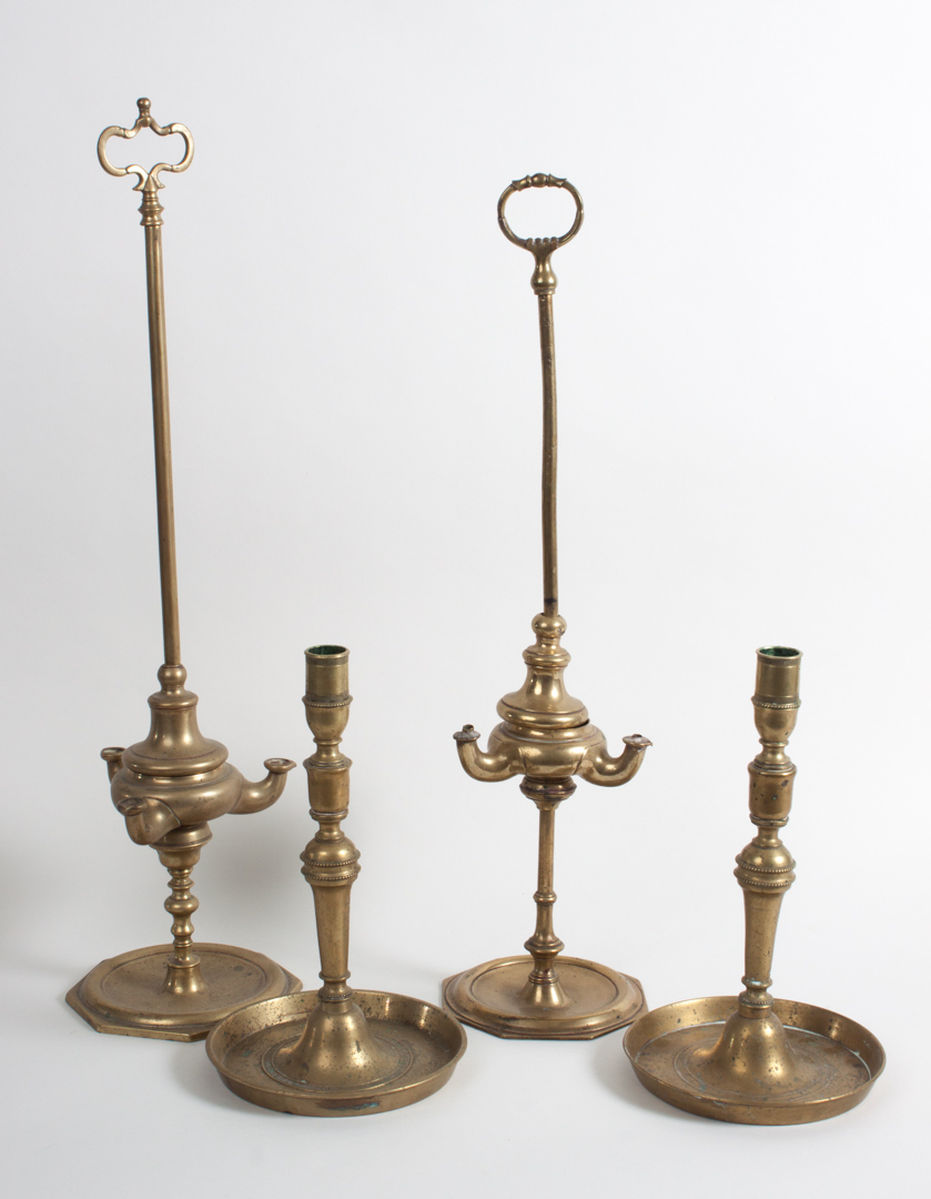 Appraisal: Pair of brass candlesticks and pair of oil lamps pair