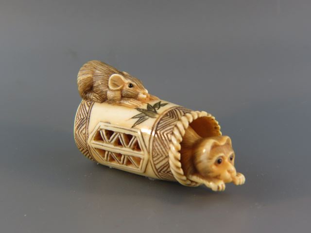 Appraisal: Carved Ivory Netsuke of a Cat and Mouse openwork and