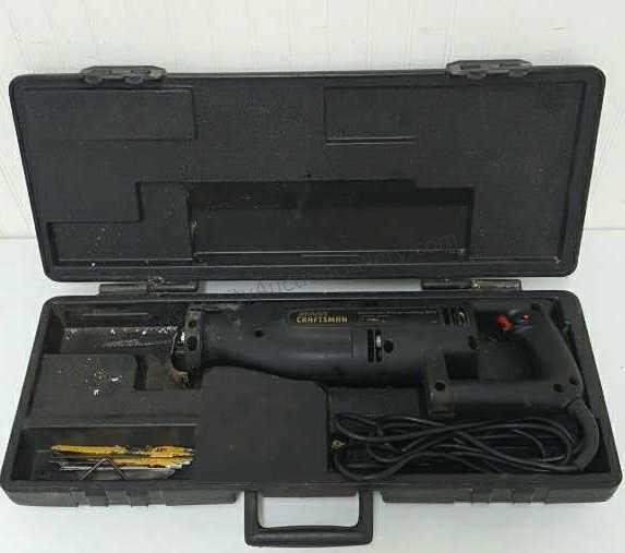 Appraisal: Sears Craftsman model electric reciprocating saw with case and extra