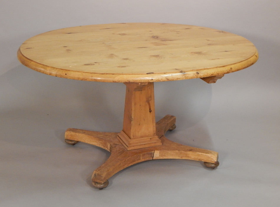 Appraisal: A Victorian pine breakfast table the oval top with a