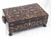 Appraisal: An Indian coromandel lady's sewing box on four turned feet