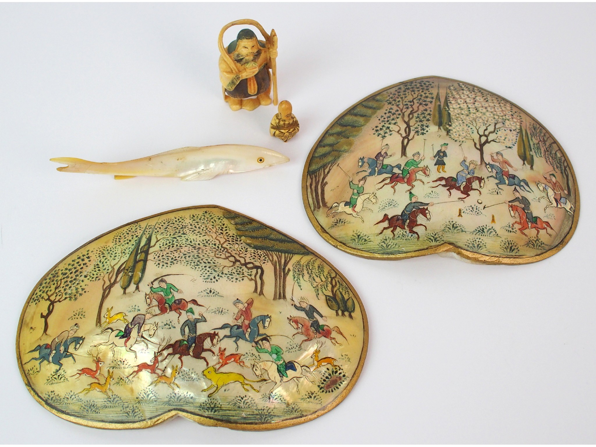 Appraisal: Two Persian polychrome abalone shell panelspainted with polo players and