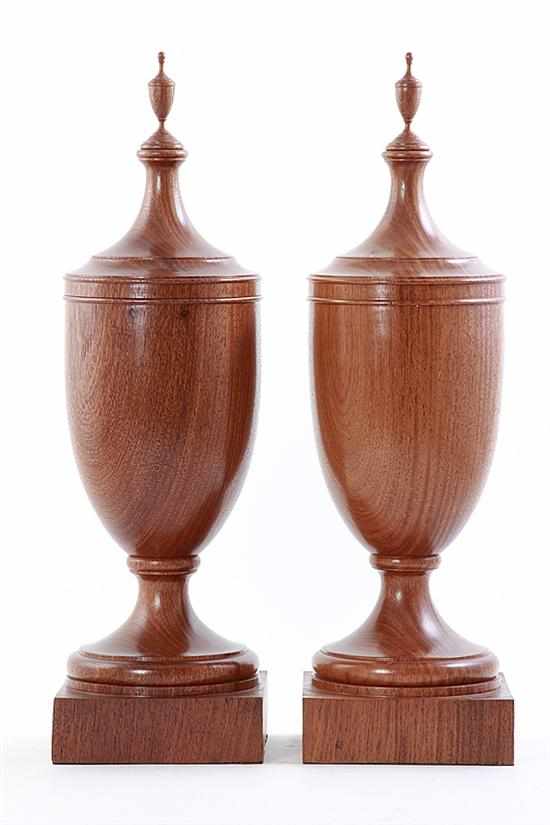 Appraisal: Pair Padauk urns Classical urn form with finial and base