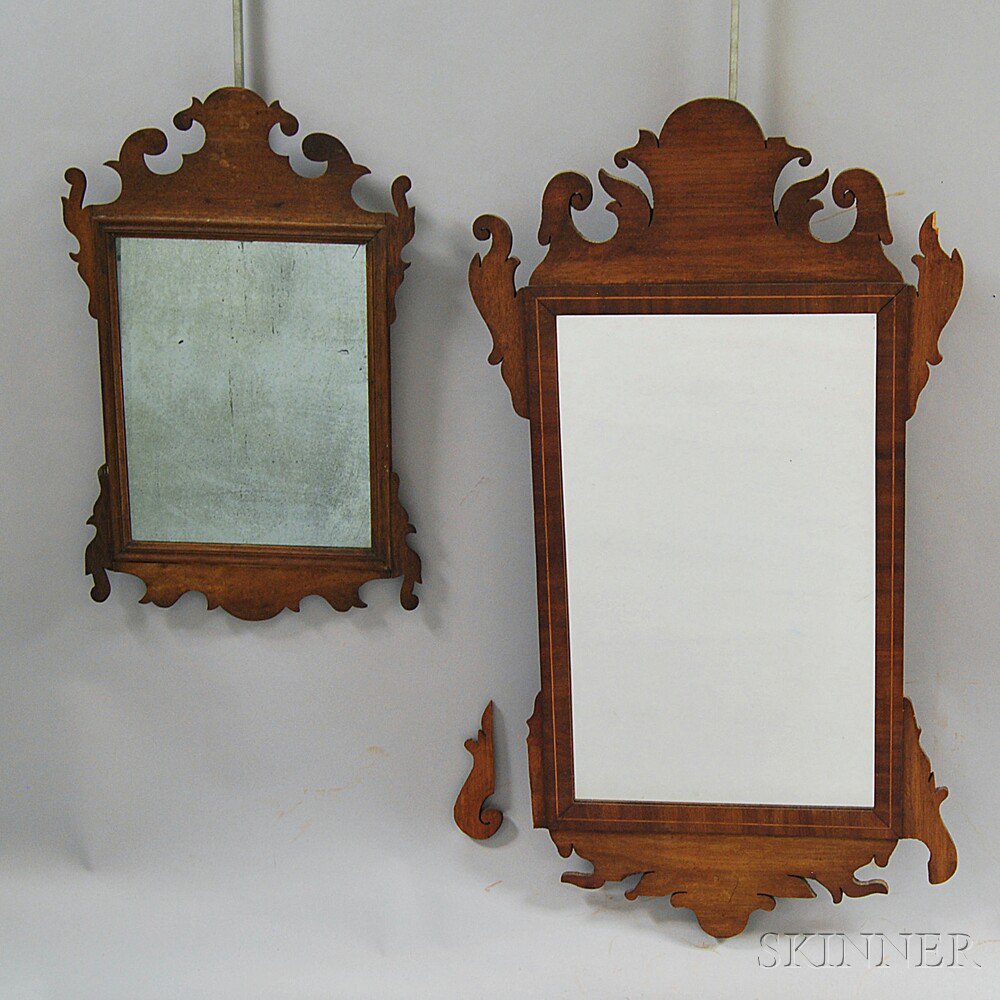 Appraisal: Two Chippendale Mahogany Scroll-frame Mirrors th century the larger with