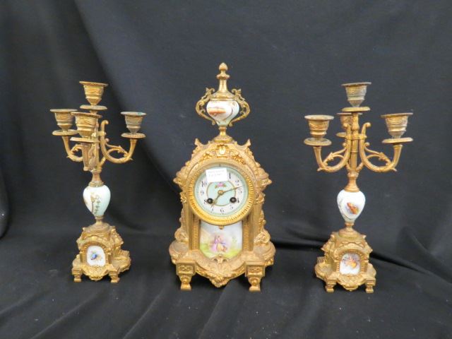 Appraisal: Sevres Porcelain Bronzed Mantle Clock Set clock plus pair of