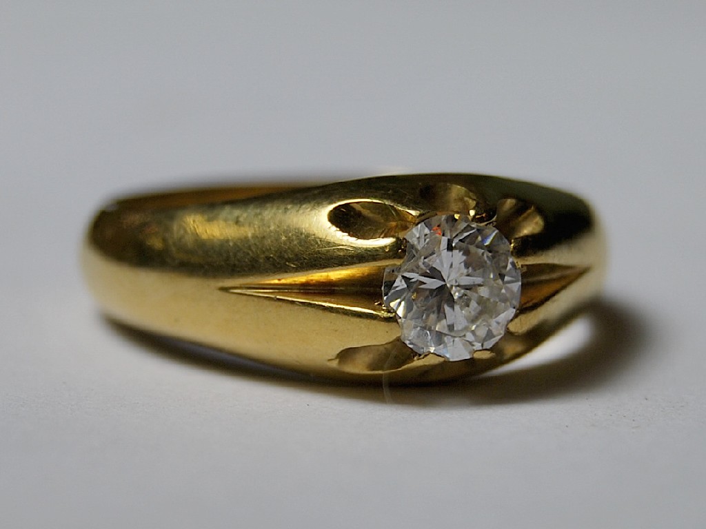 Appraisal: A heavy ct gold ring claw-set with a brilliant-cut diamond