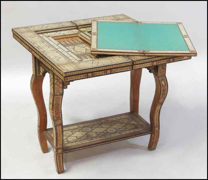 Appraisal: NORTH AFRICAN FLIP-TOP GAMES TABLE Mixed inlay with mother-of-pearl Flip