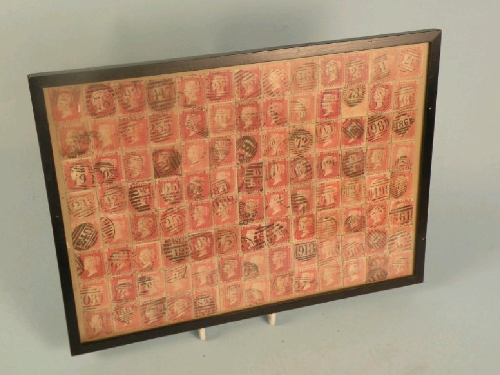 Appraisal: A quantity of Victorian penny red stamps framed