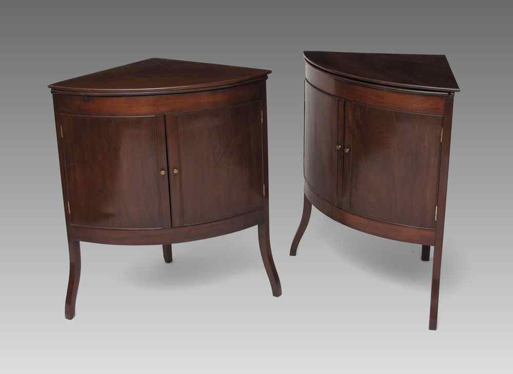 Appraisal: PAIR OF REGENCY MAHOGANY CORNER WASHSTANDS Hinged lift top converts