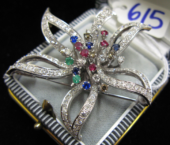 Appraisal: EMERALD SAPPHIRE RUBY DIAMOND AND FOURTEEN KARAT WHITE GOLD FLOWER