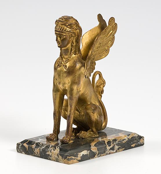 Appraisal: FRENCH NEOCLASSICAL SPHINX French th century A gilt bronze figure