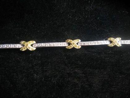 Appraisal: Contemporary karat white and yellow gold diamond bracelet Delicate seven