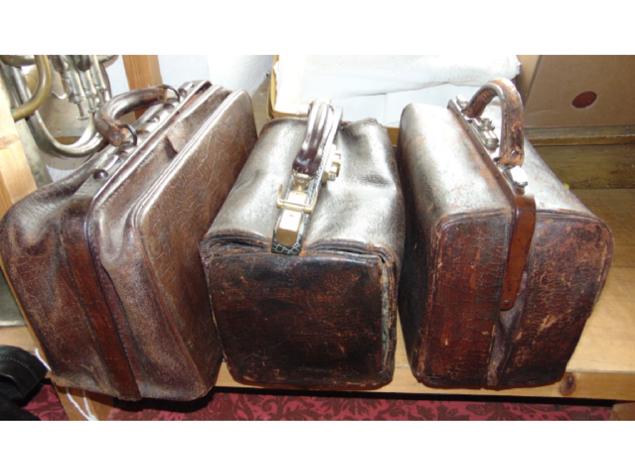 Appraisal: Three good quality antique Gladstone type leather medical doctors bags