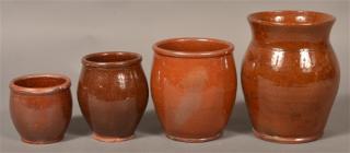 Appraisal: th Century Glazed Redware Storage Jars Four th Century Glazed