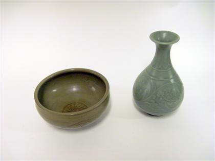 Appraisal: Two East Asian celadon ceramic vesselsComprising a Ming-style carved celadon