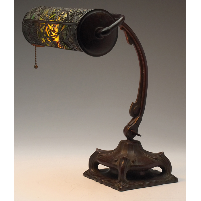 Appraisal: Handel lamp adjustable bronzed metal base and shade with an