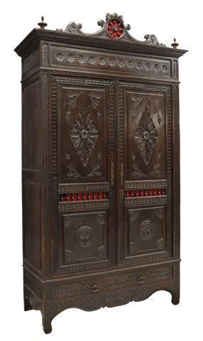 Appraisal: French Breton oak armoire bookcase late th c richly carved