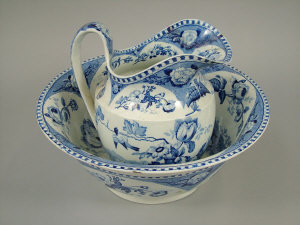 Appraisal: A Staffordshire pottery blue and white transfer printed toilet jug