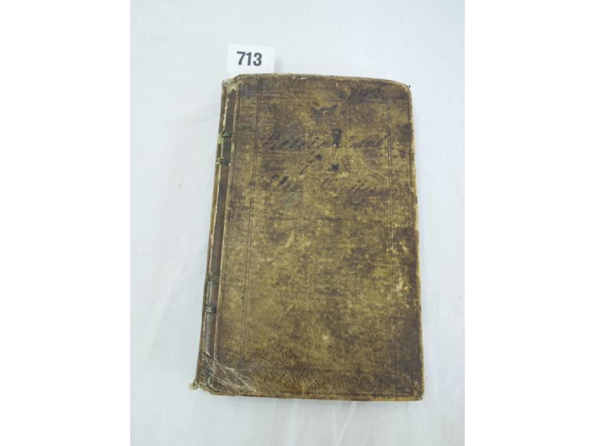 Appraisal: A velum covered hand written recipe book with the date