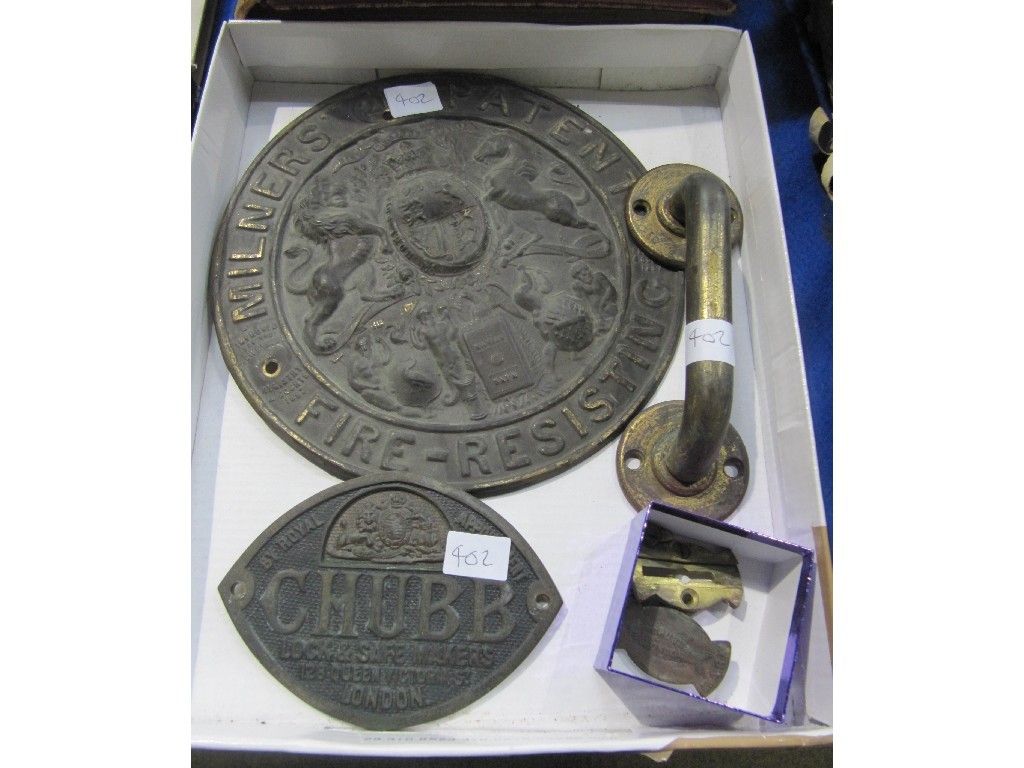 Appraisal: Lot comprising two safe door plates a handle and an