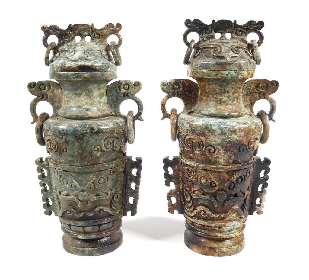 Appraisal: Pair - th century Chinese carved mottled jade lidded vases