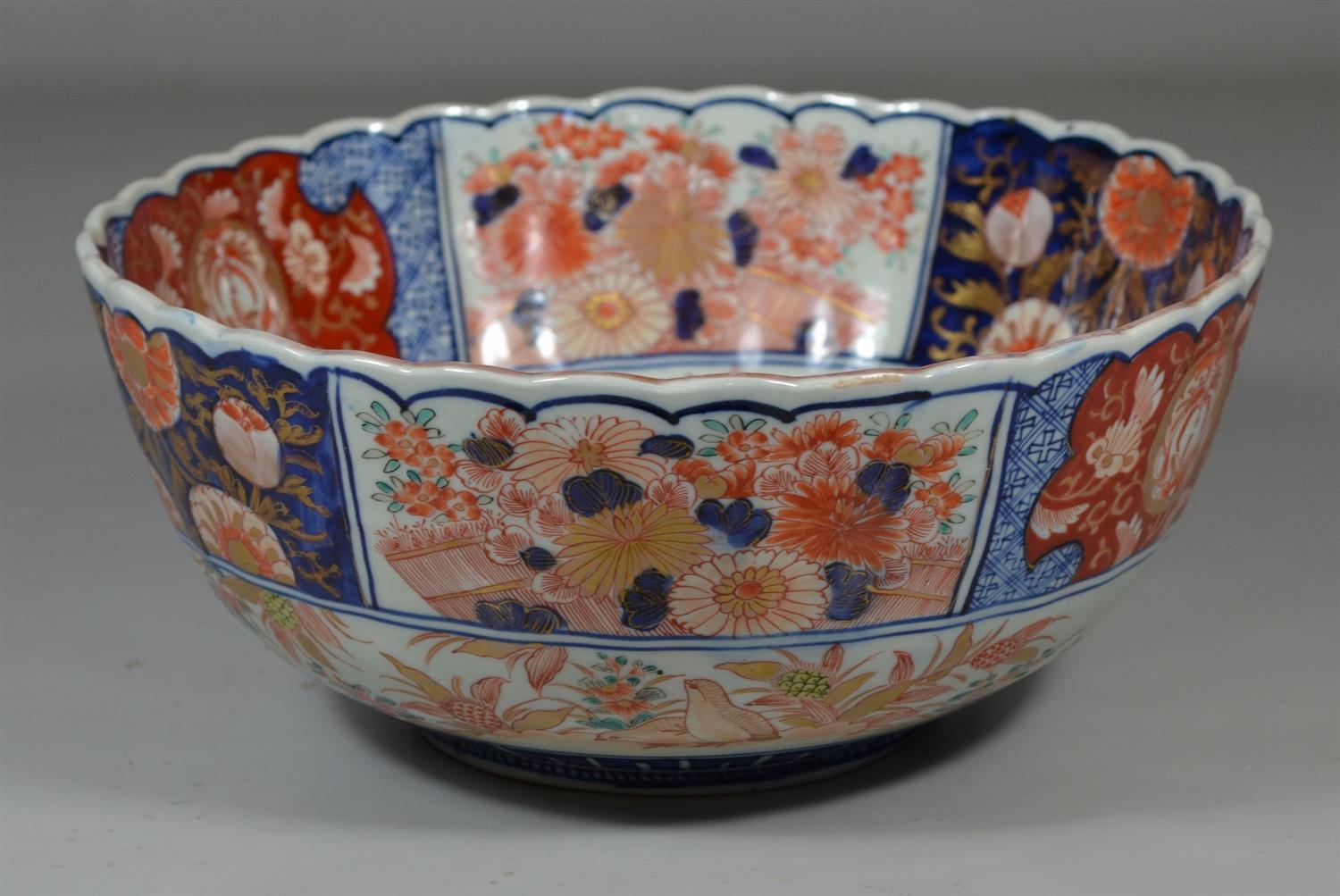 Appraisal: Japanese Imari porcelain center bowl with ruffled edge - diameter