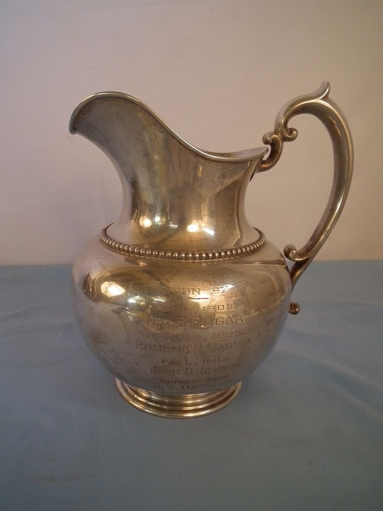 Appraisal: STERLING TROPHY PITCHER Antique sterling silver trophy pitcher with engraved