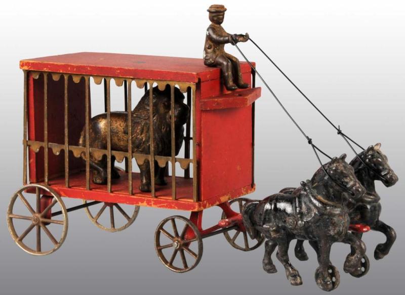 Appraisal: Cast Iron Wood Arcade -Horse Circus Wagon Toy Description Includes