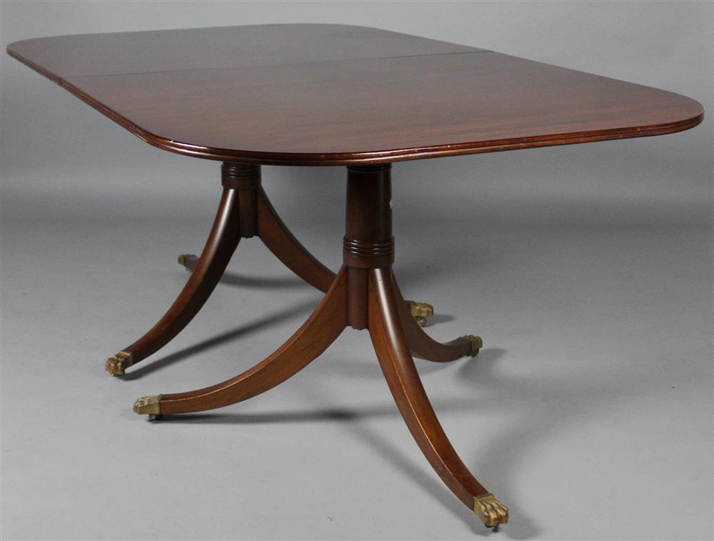 Appraisal: GEORGIAN STYLE MAHOGANY DOUBLE PEDESTAL DINING TABLE with a rectangular