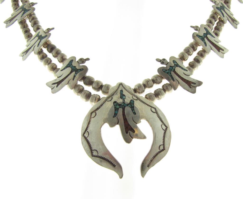 Appraisal: A silver peyote bird necklace with approximately x peyote bird