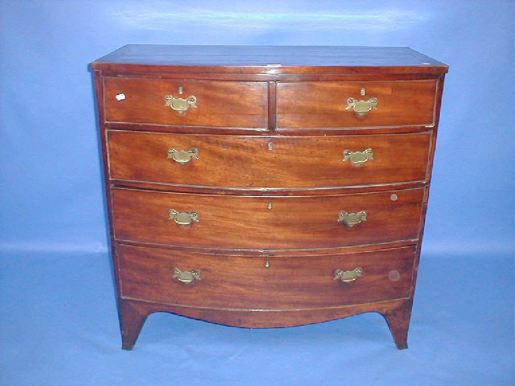 Appraisal: A Regency mahogany bow front chest of two short and