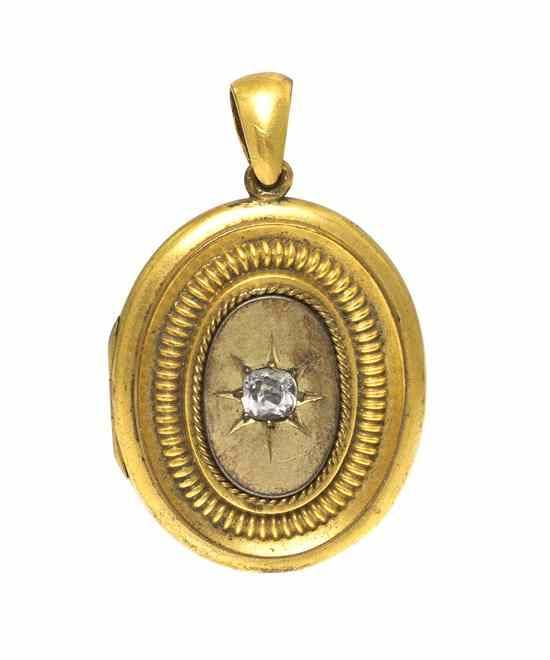 Appraisal: A Victorian Gold Tone and Paste Locket of oval form