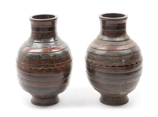 Appraisal: Sale Lot A Pair of Ceramic Vases decorated with concentric